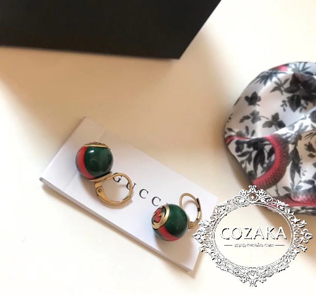 個性 丸玉ピアス GUCCI